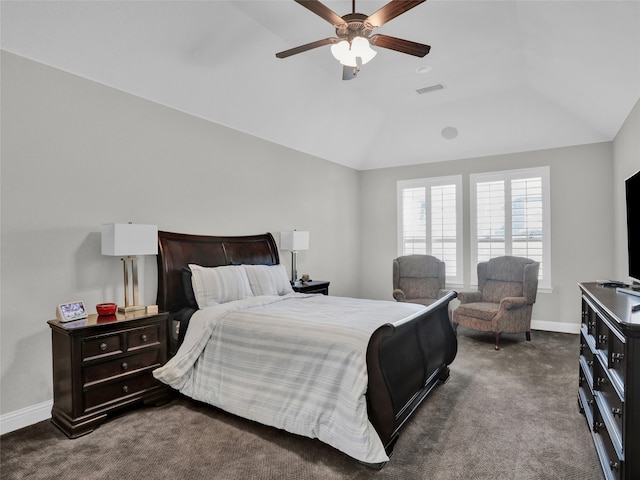 carpeted bedroom featuring ceiling fan and vaulted ceiling