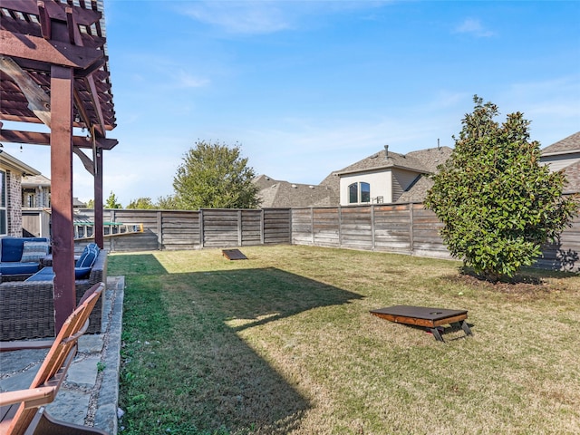 view of yard featuring outdoor lounge area and a pergola