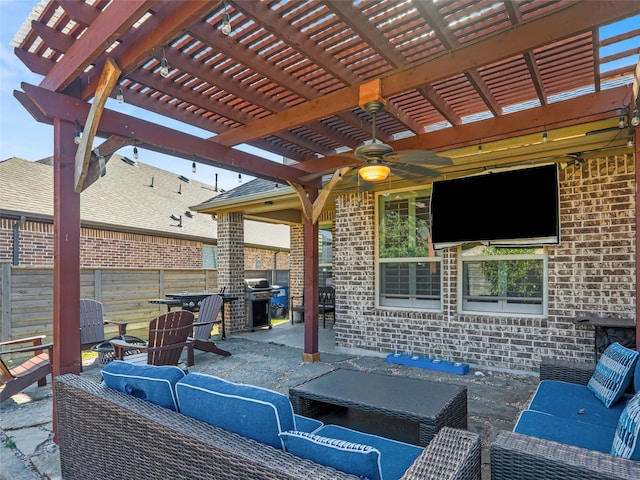 view of patio featuring an outdoor living space, a pergola, and ceiling fan