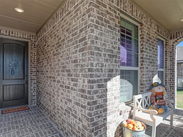 property entrance featuring covered porch