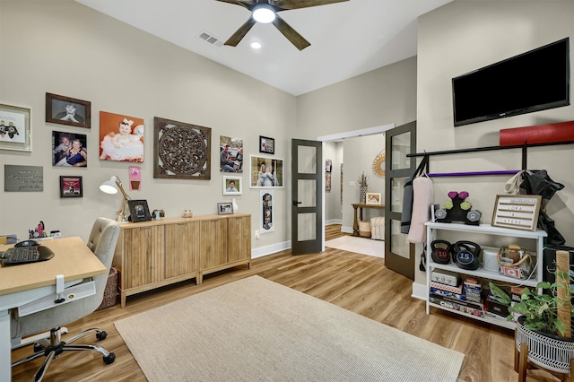 office area featuring ceiling fan, french doors, and wood-type flooring