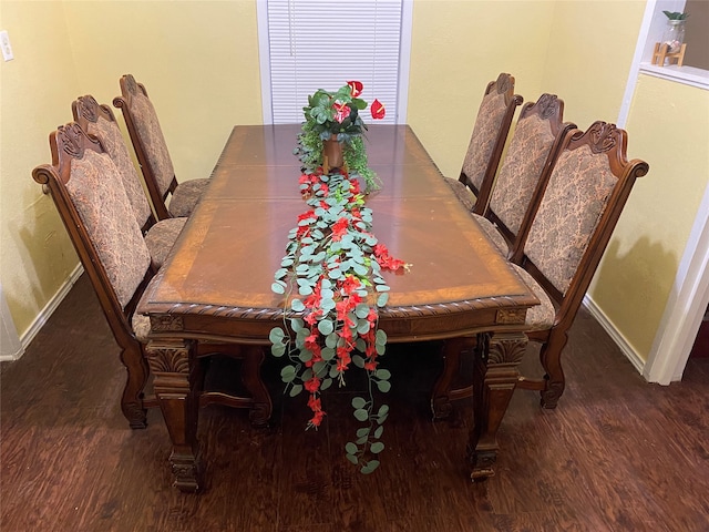 dining area featuring dark hardwood / wood-style flooring