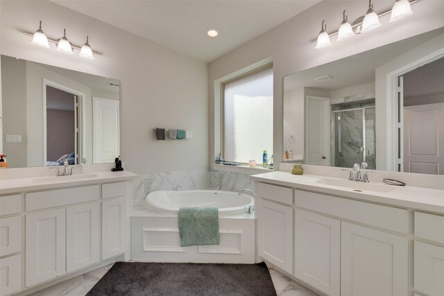 bathroom with vanity and plus walk in shower