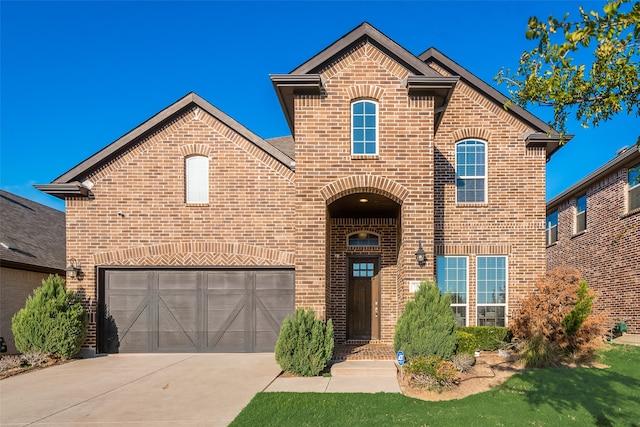 front of property with a garage