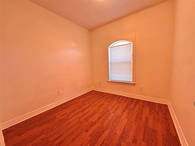 unfurnished room featuring hardwood / wood-style floors