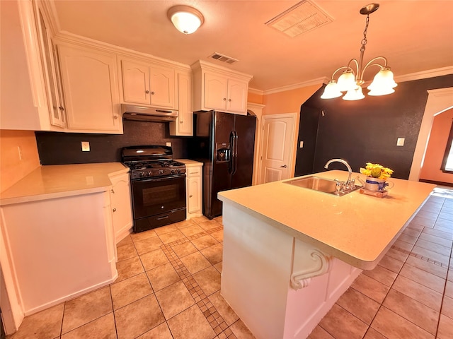 kitchen with white cabinetry, sink, an island with sink, extractor fan, and black appliances