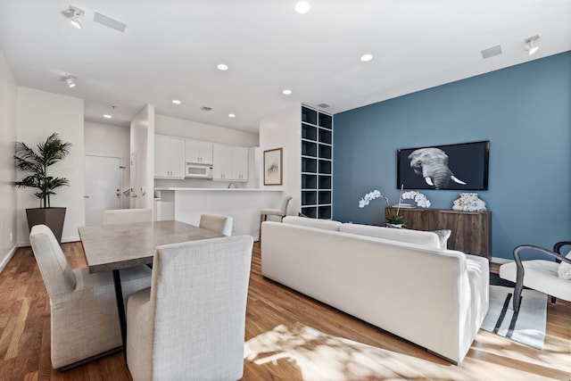 dining area featuring light hardwood / wood-style flooring