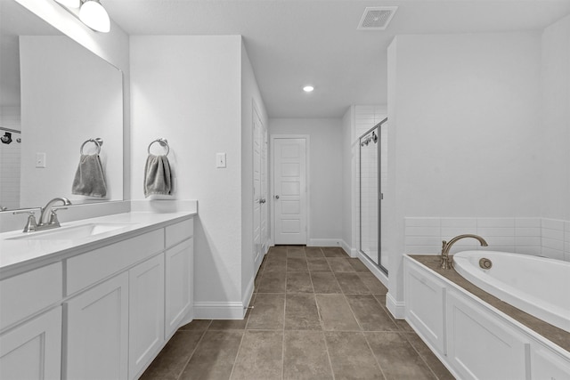 bathroom featuring plus walk in shower and vanity