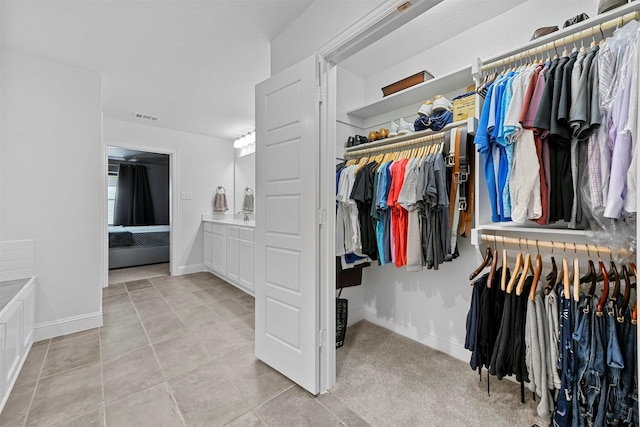 interior space with tile patterned flooring and vanity
