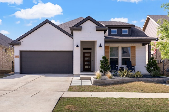 view of front of home with a garage