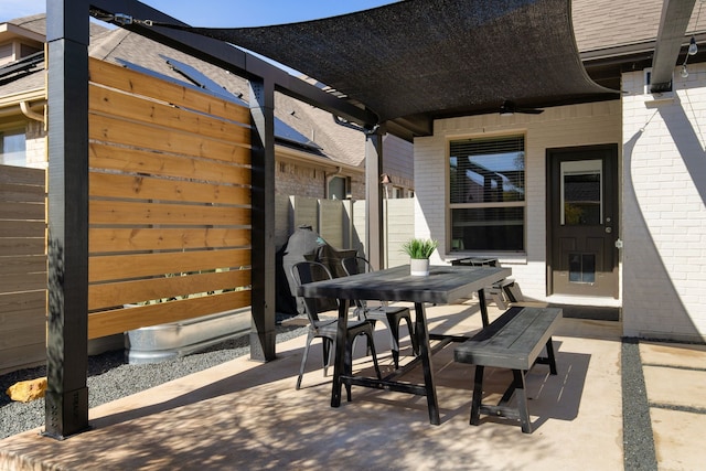 view of patio featuring ceiling fan