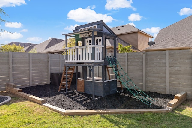 view of jungle gym with a yard