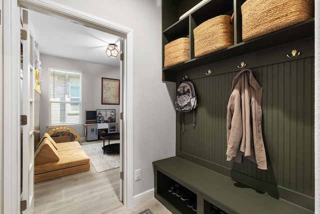 mudroom with hardwood / wood-style floors