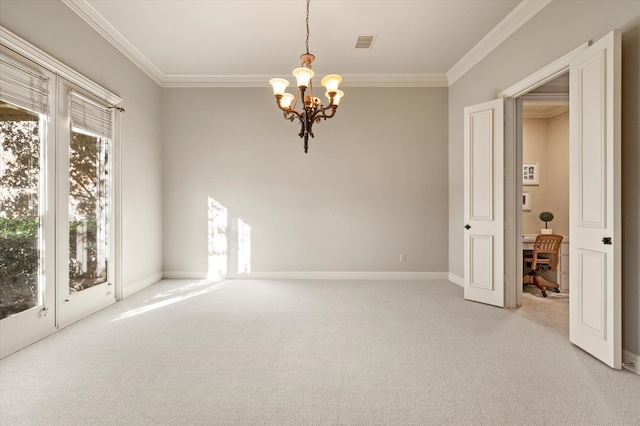 spare room with an inviting chandelier, light colored carpet, and ornamental molding