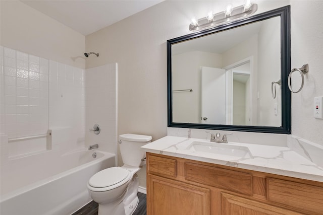 full bathroom with toilet, vanity, and shower / tub combination