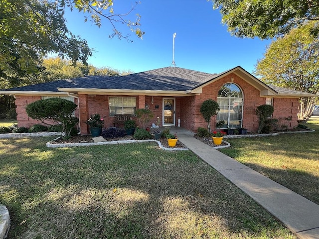 ranch-style house with a front yard