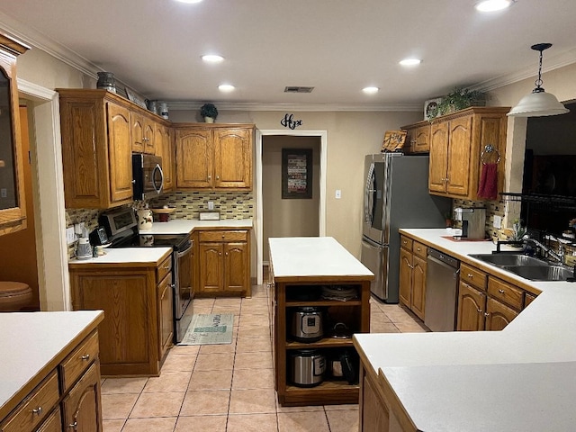 kitchen with sink, stainless steel appliances, crown molding, pendant lighting, and light tile patterned flooring