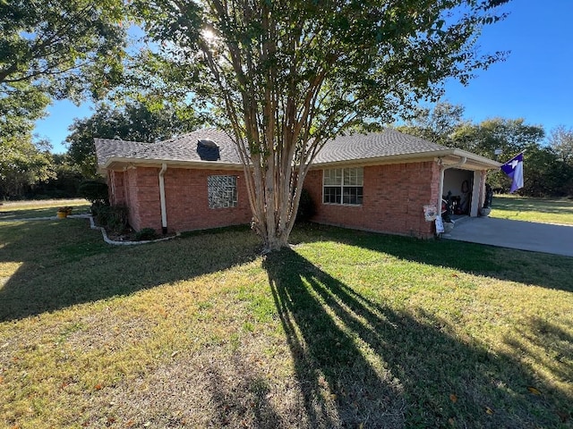 view of home's exterior featuring a lawn