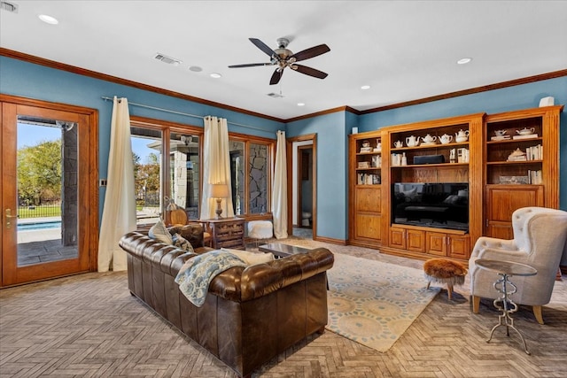 living room with ceiling fan, ornamental molding, and light parquet floors