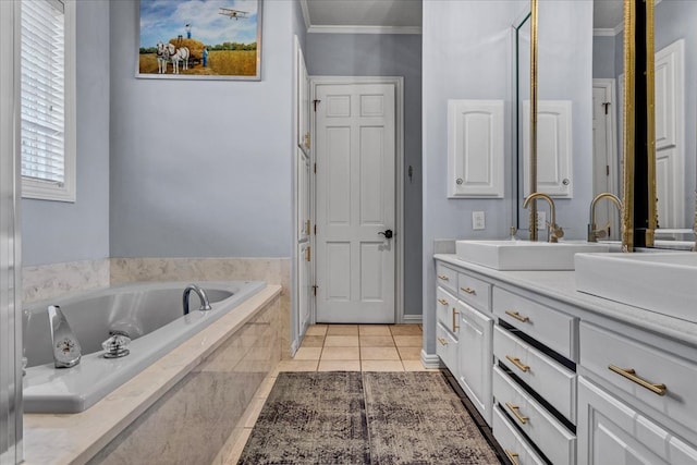 bathroom with vanity, tile patterned floors, ornamental molding, and tiled tub