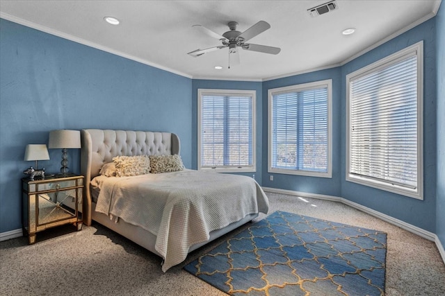 bedroom featuring carpet flooring, ceiling fan, and crown molding