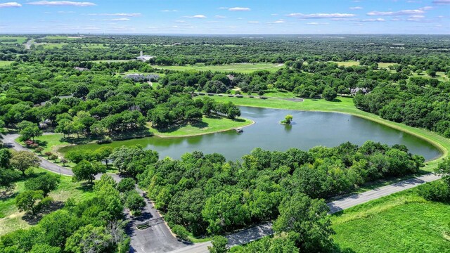 362 Woodland Hills Dr, Sherman, TX 75092 - drone / aerial view of a nearby body of water and a heavily wooded area