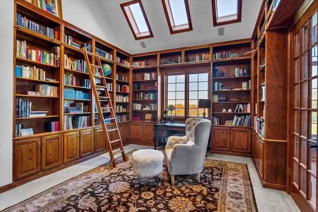 home office featuring light colored carpet and lofted ceiling