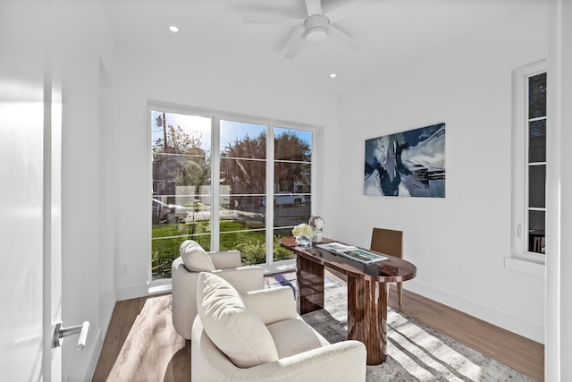 home office featuring ceiling fan and hardwood / wood-style flooring