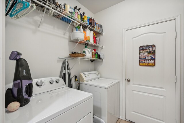 laundry room with independent washer and dryer