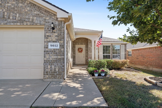 entrance to property with a garage