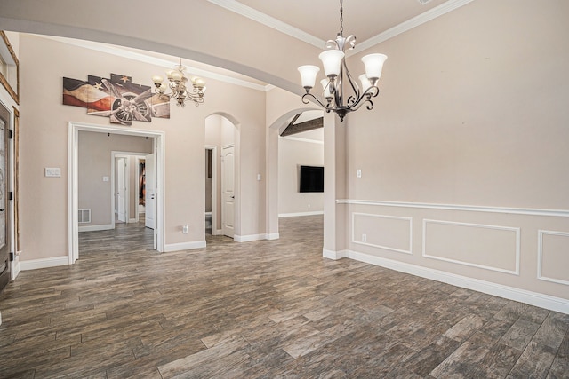 unfurnished dining area with ornamental molding and dark wood-type flooring