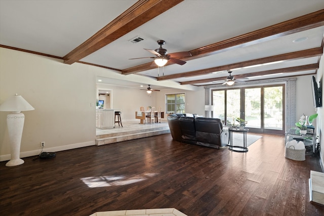 unfurnished living room featuring beam ceiling, dark hardwood / wood-style flooring, and crown molding