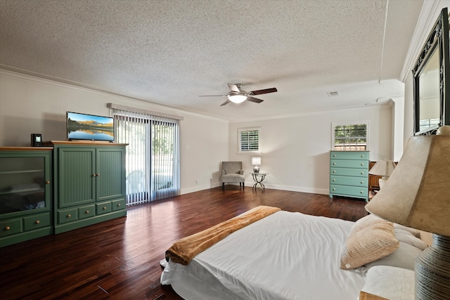 bedroom with access to exterior, ceiling fan, dark wood-type flooring, crown molding, and a textured ceiling