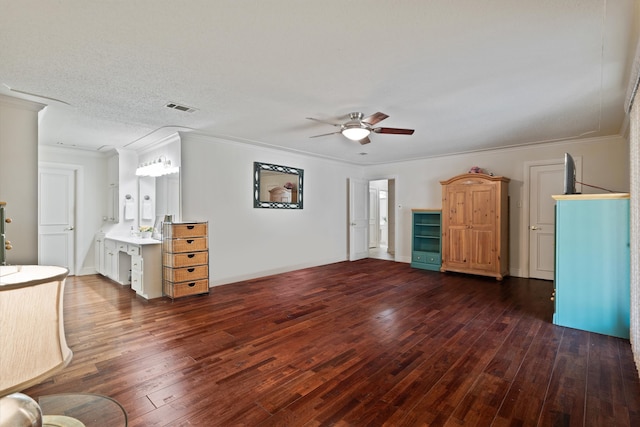 unfurnished living room with a textured ceiling, ceiling fan, dark hardwood / wood-style flooring, and crown molding