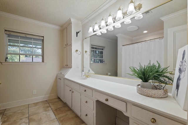 bathroom featuring tile patterned flooring, vanity, a textured ceiling, and ornamental molding