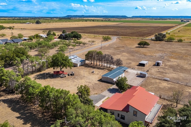 aerial view featuring a mountain view and a rural view