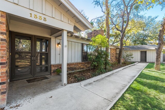 entrance to property featuring french doors