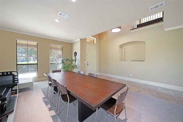 tiled dining space with crown molding