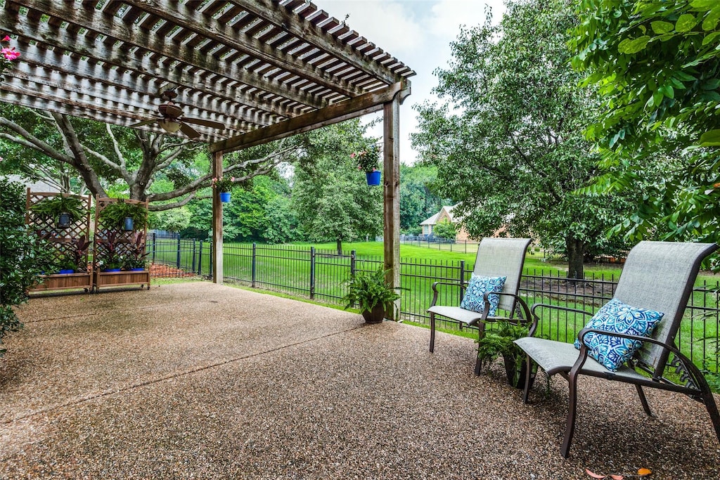 view of patio featuring a pergola