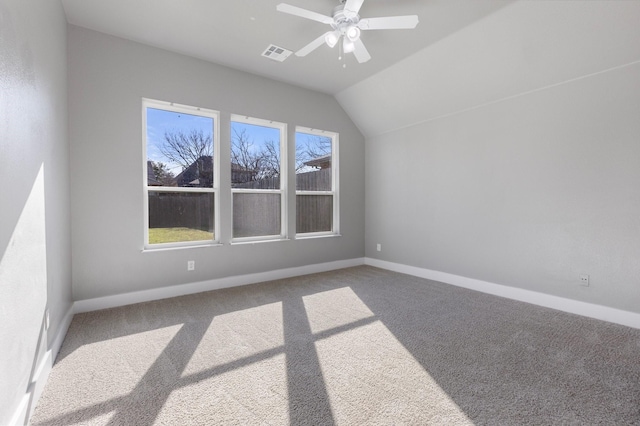 bonus room featuring visible vents, lofted ceiling, baseboards, and carpet flooring