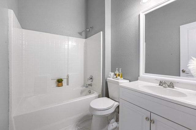 bathroom featuring vanity,  shower combination, toilet, and a textured wall