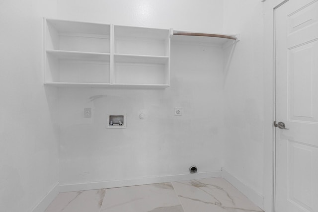 laundry area featuring baseboards, gas dryer hookup, laundry area, electric dryer hookup, and marble finish floor