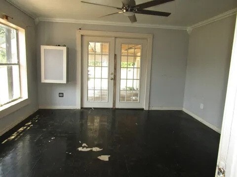 unfurnished room with french doors, ceiling fan, and ornamental molding