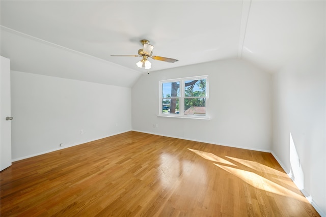 bonus room with ceiling fan, vaulted ceiling, and hardwood / wood-style flooring