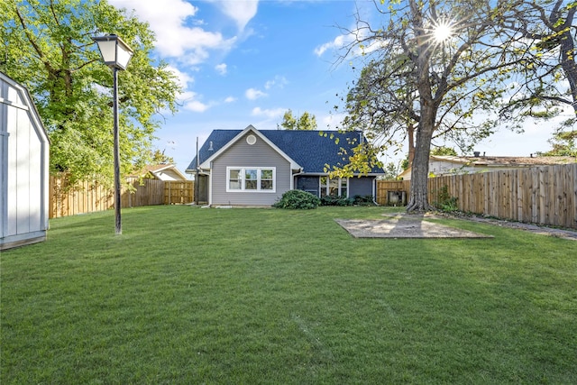 back of house featuring a patio and a lawn