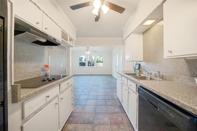 kitchen with sink, white cabinets, and black appliances