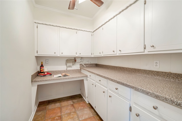 kitchen with white cabinets, ceiling fan, and crown molding