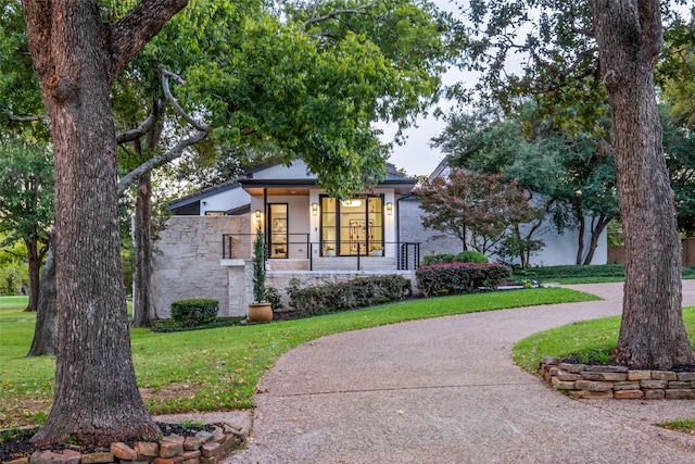 view of front of house with a front yard