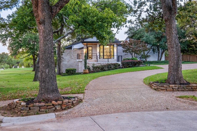 view of front of home with a front yard