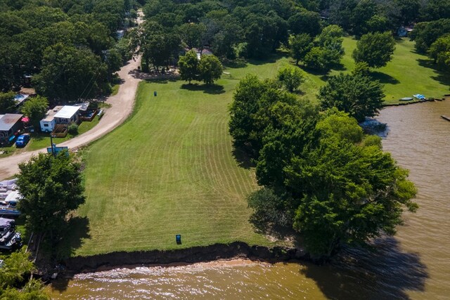 drone / aerial view with a rural view and a water view